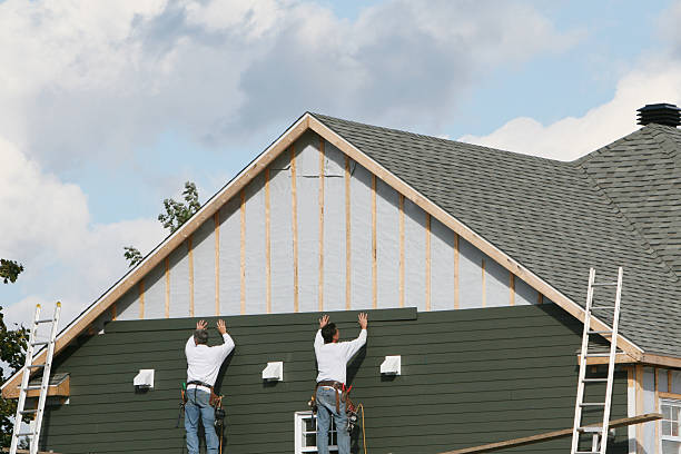 Professional Siding technician working in Gracewood, GA